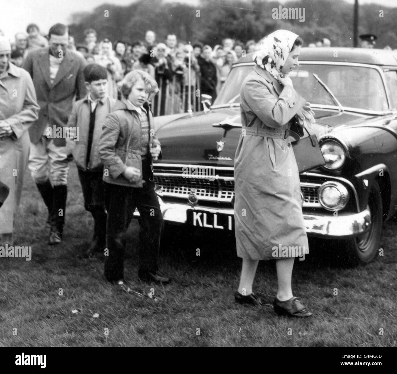 La regina Elisabetta II con i suoi figli il principe Carlo e la principessa Anna al campo di polo di Smith's Lawn, Windsor Great Park. A sinistra si trova la Principessa Andrea di Grecia, madre del Duca di Edimburgo. Foto Stock