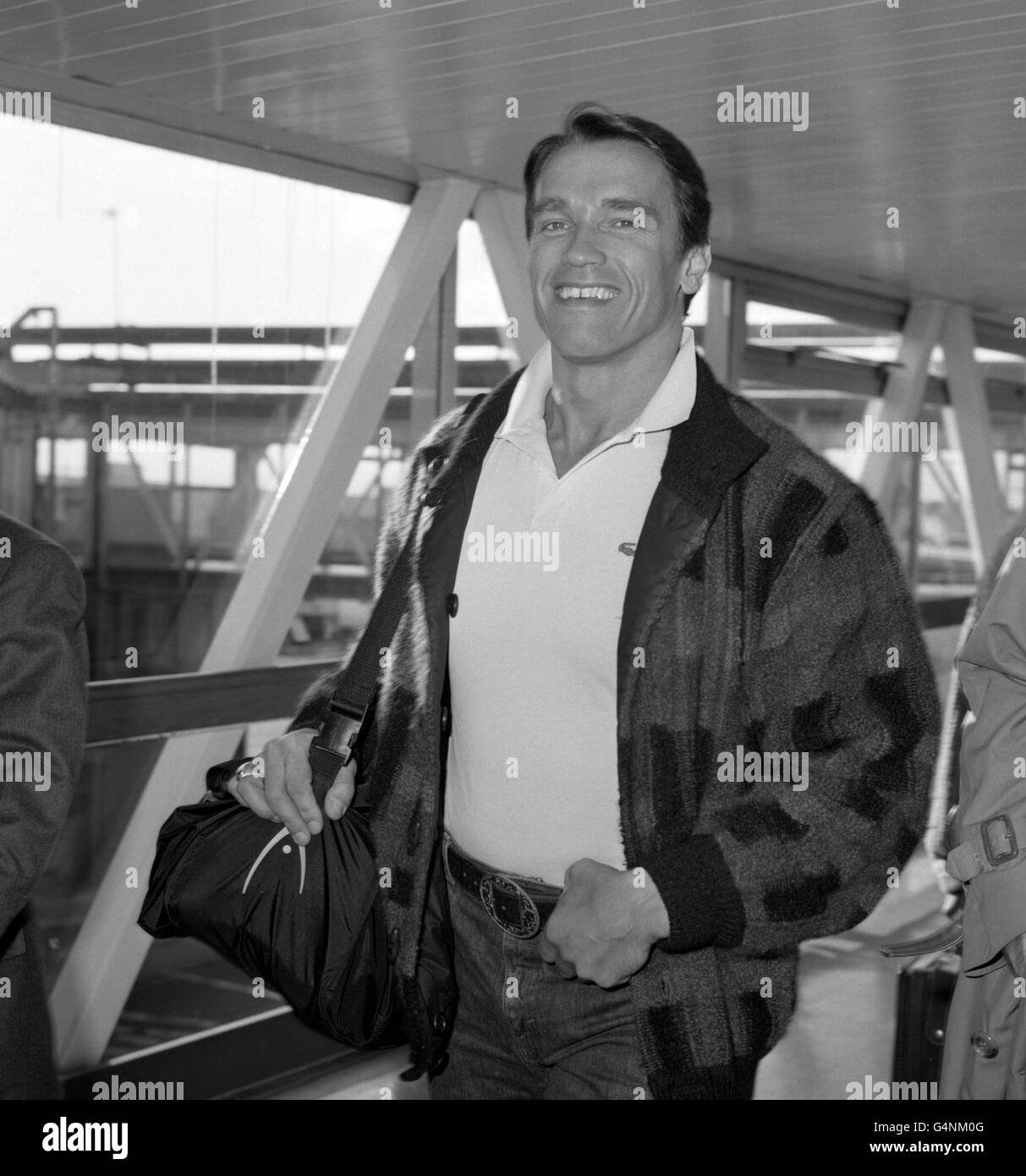 Film - Arnold Schwarzenegger - Aeroporto di Heathrow Foto Stock