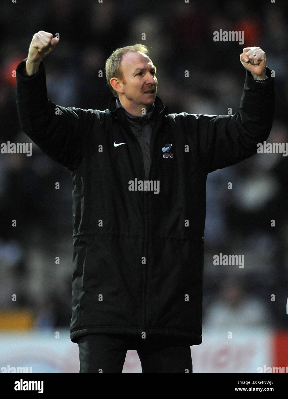 Il manager di Scunthorpe United Alan Knill festeggia dopo che Andy Barcham (non illustrato) ha ottenuto il gol equalizzante del loro fianco durante la partita di Npower Football League 1 a Meadow Lane, Nottingham. Foto Stock