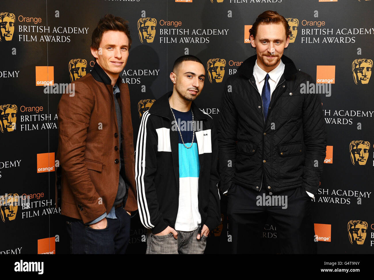(Da sinistra a destra) Eddie Redmayne, Adam Deacon e Tom Hiddleston, i candidati al premio Orange Wednesday Rising Star BAFTA di Londra. Foto Stock