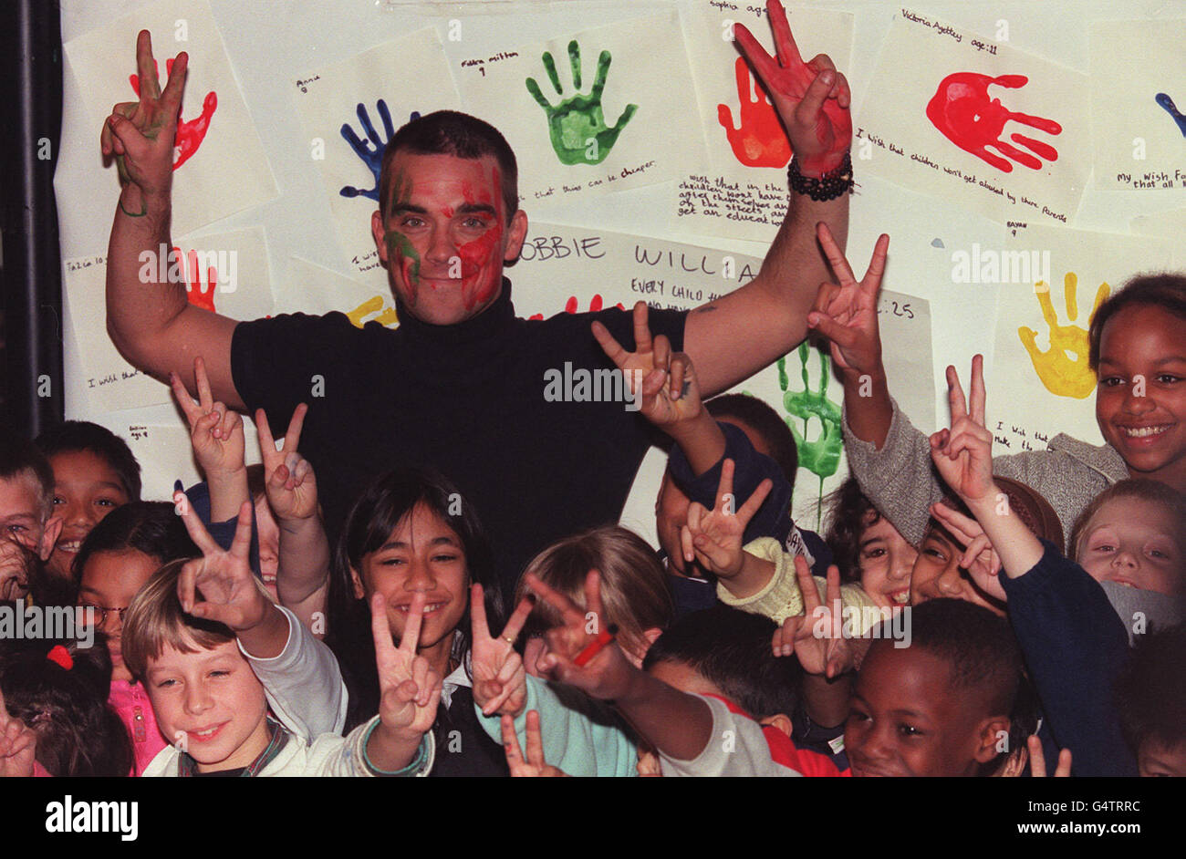 Robbie Williams/UNICEF Foto Stock