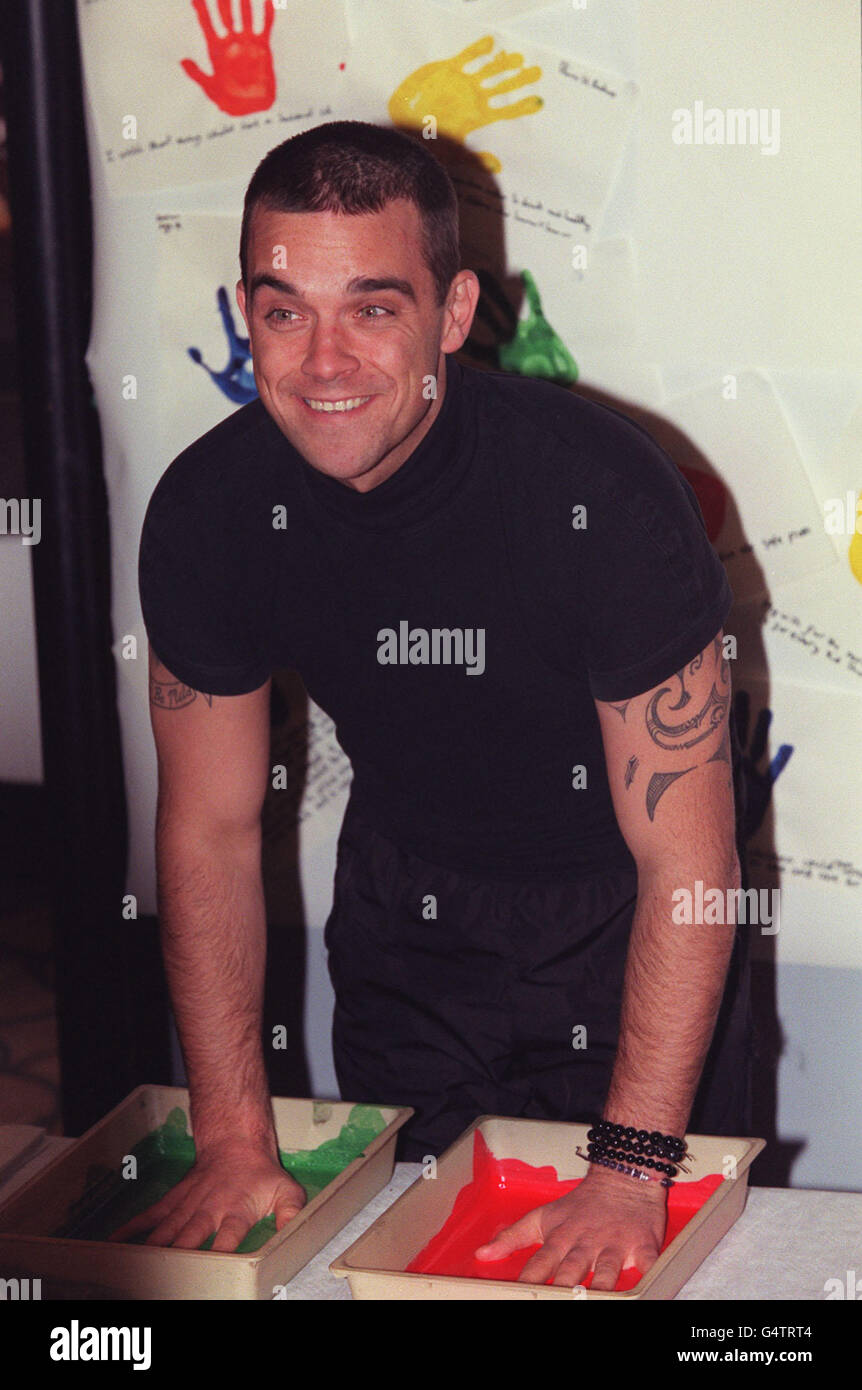 Robbie Williams/UNICEF Foto Stock