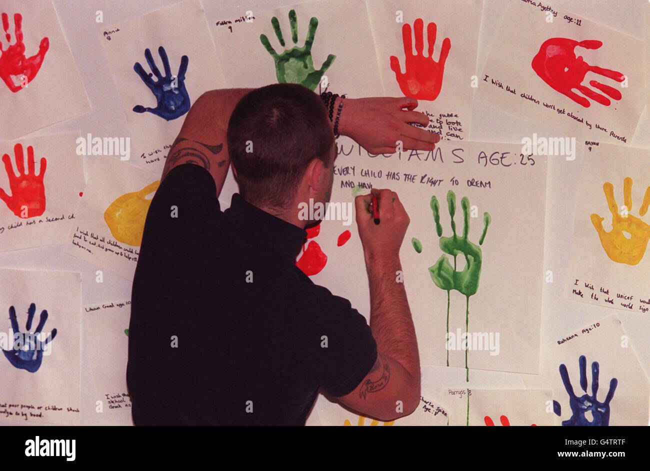 Robbie Williams/UNICEF Foto Stock