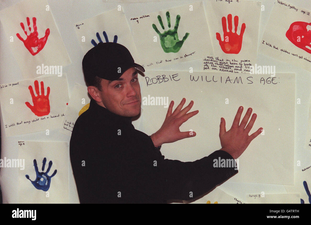 Robbie Williams/UNICEF Foto Stock