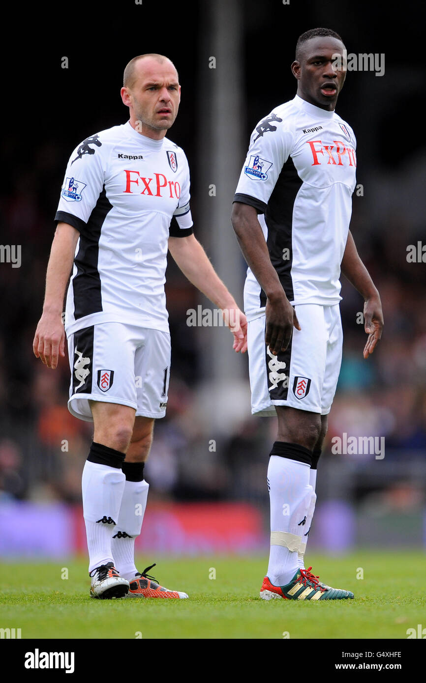 Calcio - Barclays Premier League - Fulham v Sunderland - Craven Cottage. Danny Murphy di Fulham (a sinistra) e Mahamadou Diarra Foto Stock