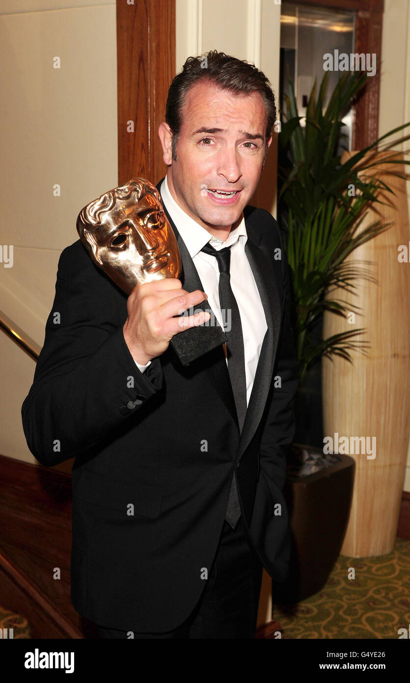 Jean Dujardin arrivo al BAFTA After Party al Grosvenor Hotel di Londra. Foto Stock