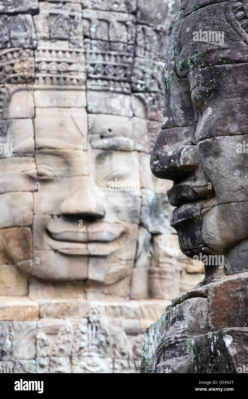 Facce buddista sul tempio Bayon in Angkor Foto Stock