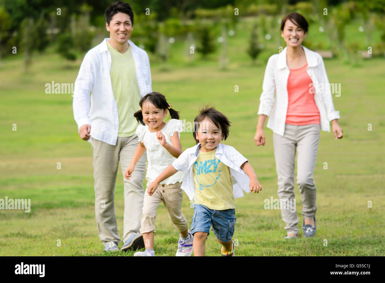 Famiglia giapponese presso il parco Foto Stock
