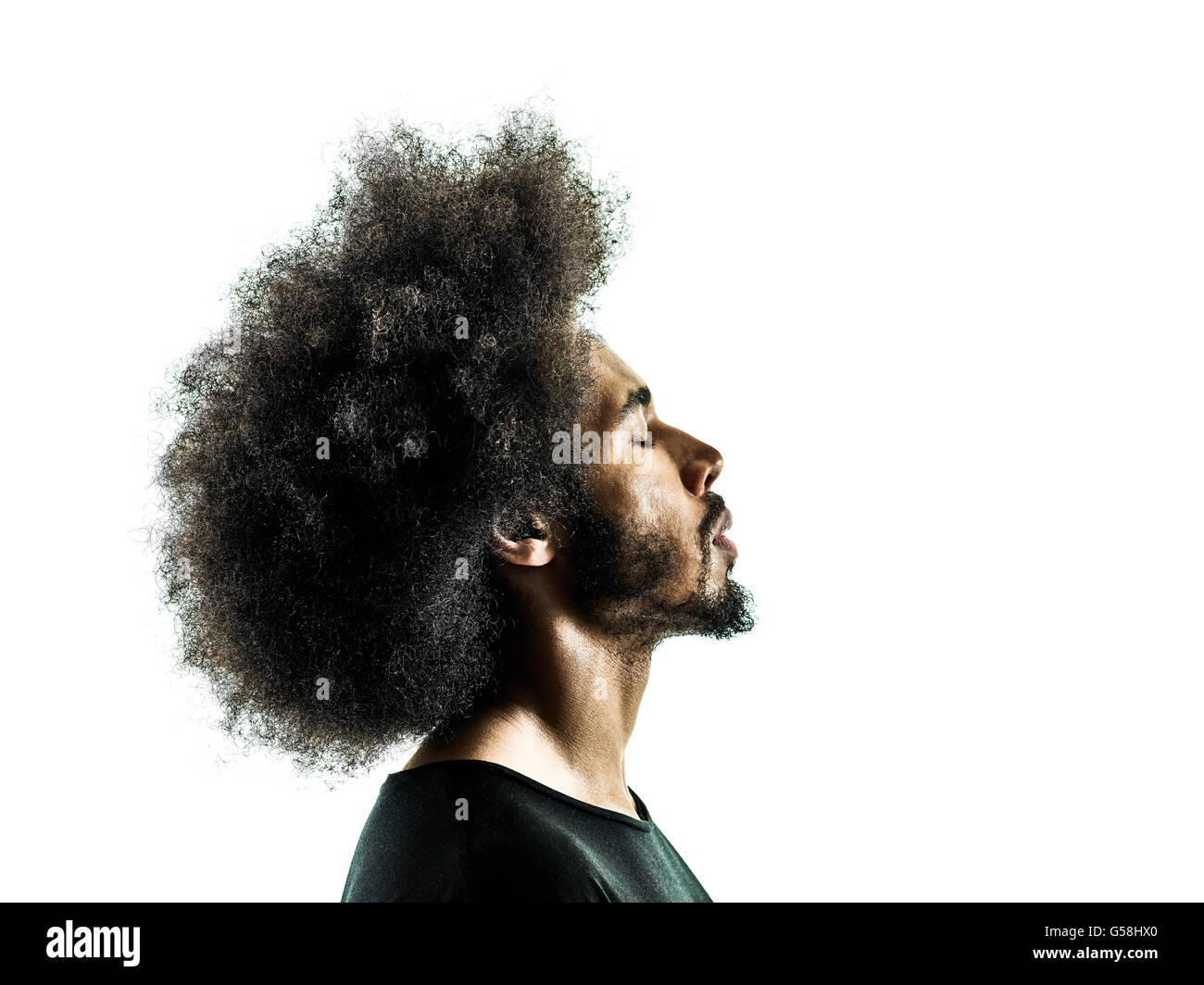 Un uomo africano profilo verticale in silhouette isolati su sfondo bianco Foto Stock