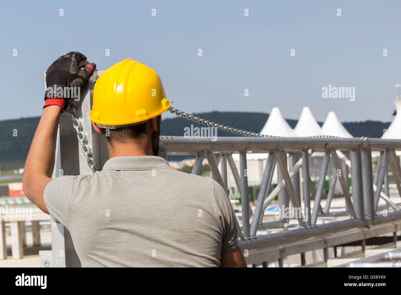 Lavoratori edificio fase costruzione di travatura reticolare Foto Stock