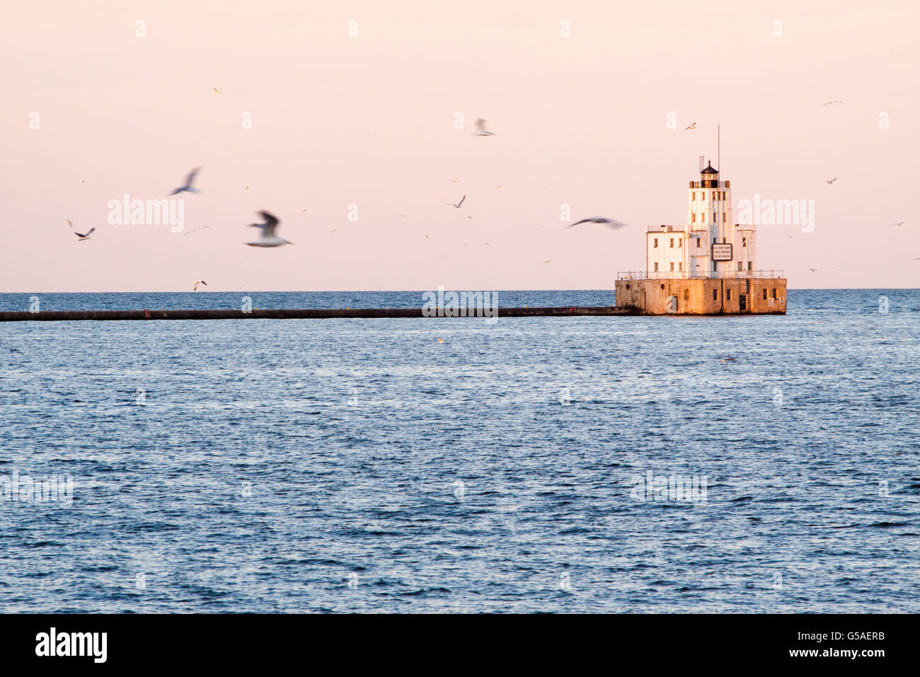 Milwaukee frangionde faro al tramonto Foto Stock
