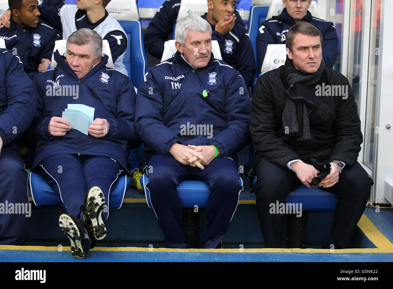 L-R: Il primo allenatore di squadra di Birmingham City Derek Fazackerley, l'assistente manager Terry McDermott e il manager Lee Clark Foto Stock