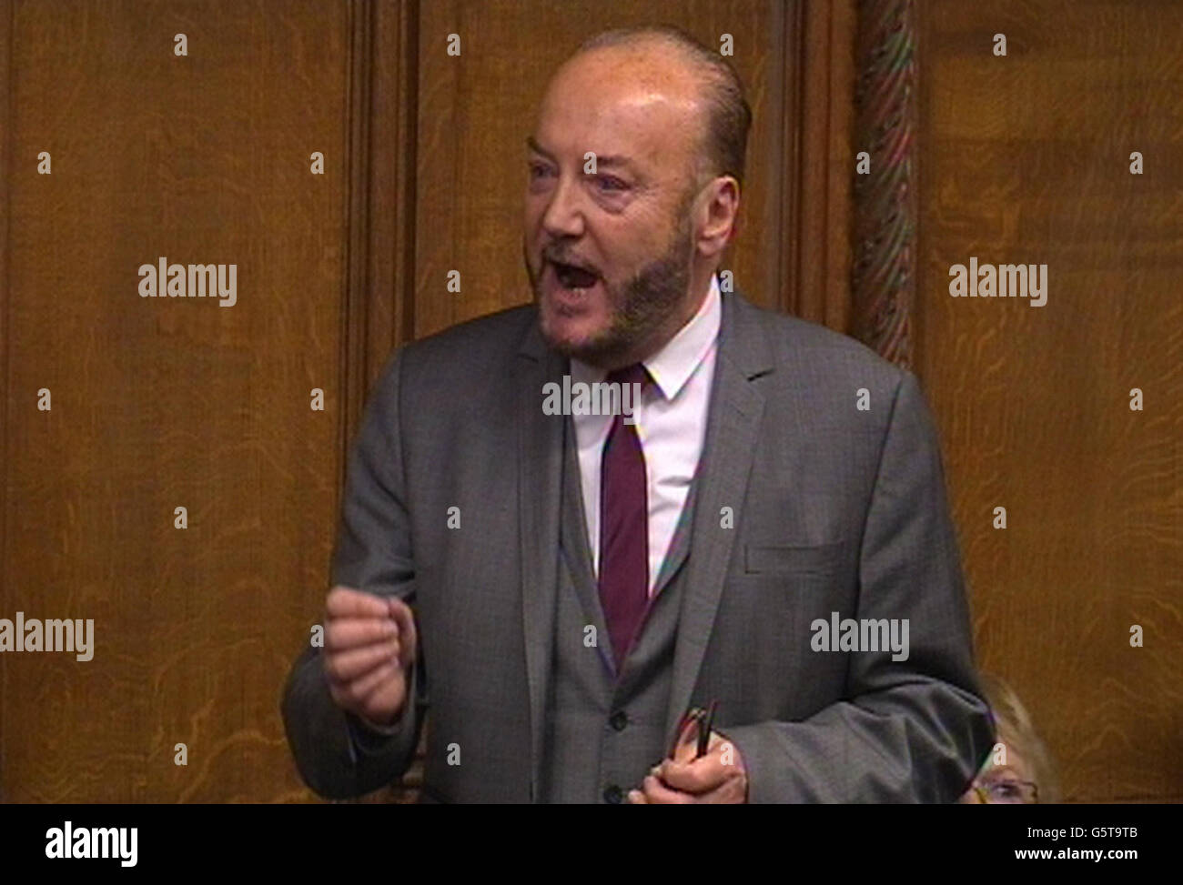 George Galloway parlando oggi nei comuni come il deputato di Bradford West ha affermato che non c'era differenza tra i combattenti jihadisti che tentavano di deporre il governo del Mali e i ribelli siriani che combattevano il presidente Bashar Assad, che egli definì "altrettanto assetato di sangue”. Foto Stock George Galloway parlando oggi nei comuni come il deputato di Bradford West ha affermato che non c'era differenza tra i combattenti jihadisti che tentavano di deporre il governo del Mali e i ribelli siriani che combattevano il presidente Bashar Assad, che egli definì "altrettanto assetato di sangue”. Foto Stock
