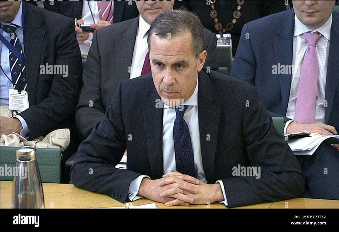 Governatore della Banca d'Inghilterra in attesa Mark Carney che parla alla Camera dei Comuni Treasury Select Committee at, Portcullis House. Foto Stock