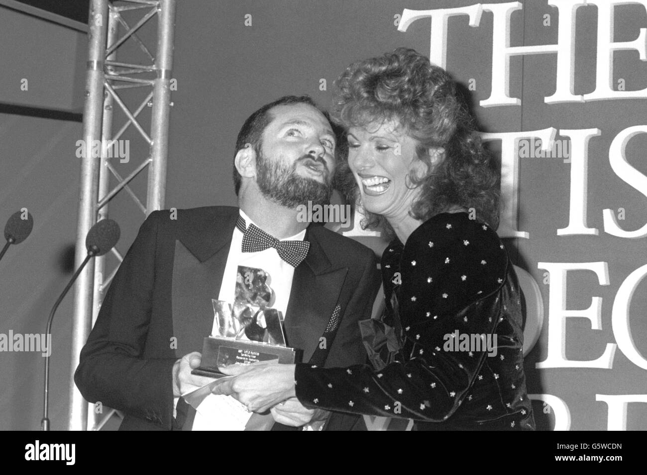 Intrattenimento - Kenny Everett e Lizzie Webb - British Video Awards cena - Grosvenor House Hotel Londra Foto Stock