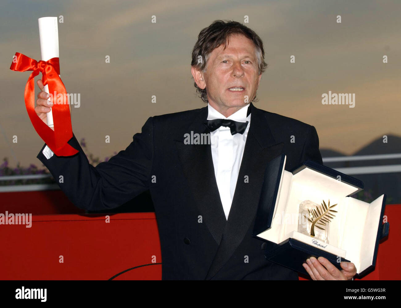 Regista Roman Polanski con il Palme d'Or ha ricevuto per il suo film "il pianista" al Palais des Festival, al 55° Festival di Cannes. Foto Stock