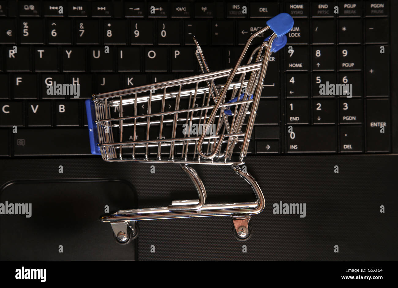 Acquisto online shopping sfondo carrello Foto Stock