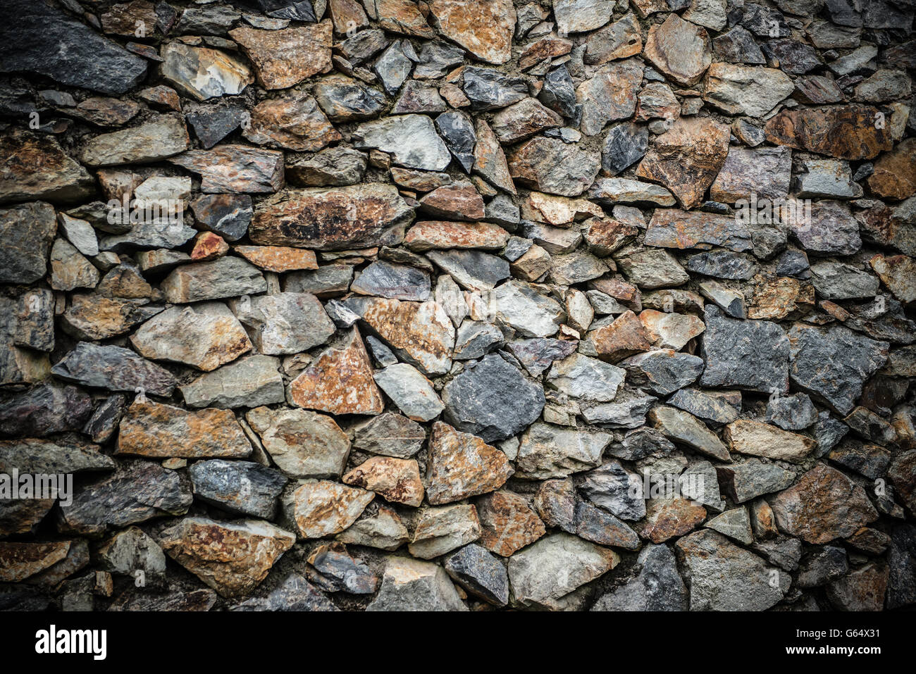 Background e texture di parete costituita da rocce Foto Stock