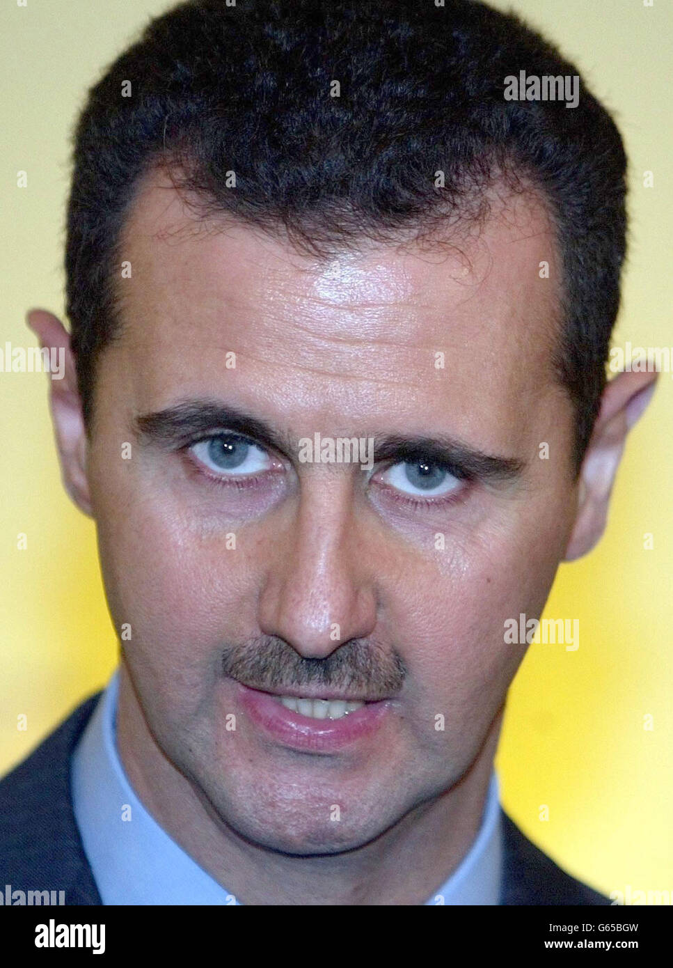 Il presidente della Siria, Bashar al-Assad si rivolge ai media durante una conferenza stampa congiunta con il primo ministro britannico Tony Blair, a Downing St, Londra. Foto Stock