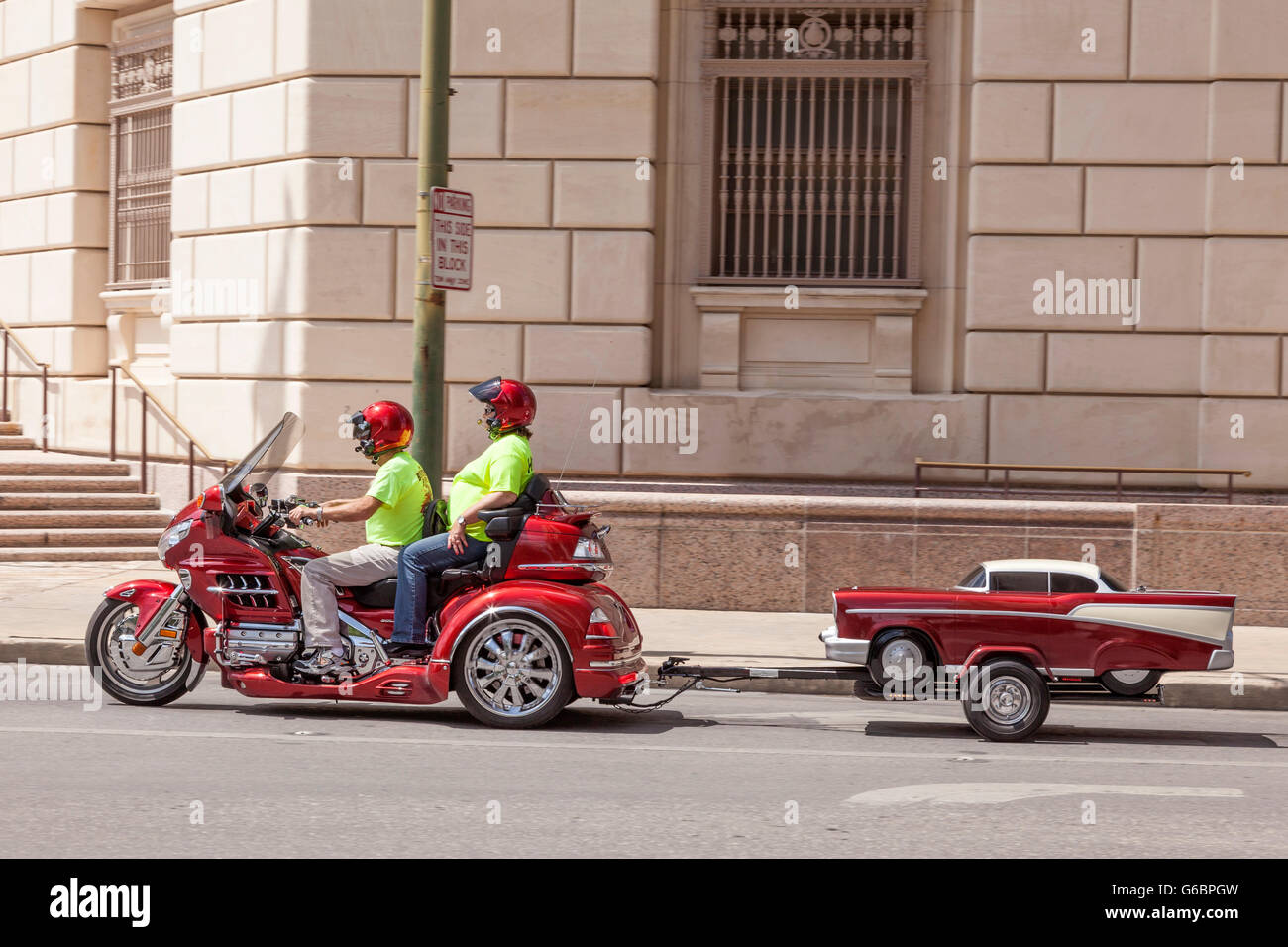 Honda veicoli a tre ruote con un rimorchio Foto Stock