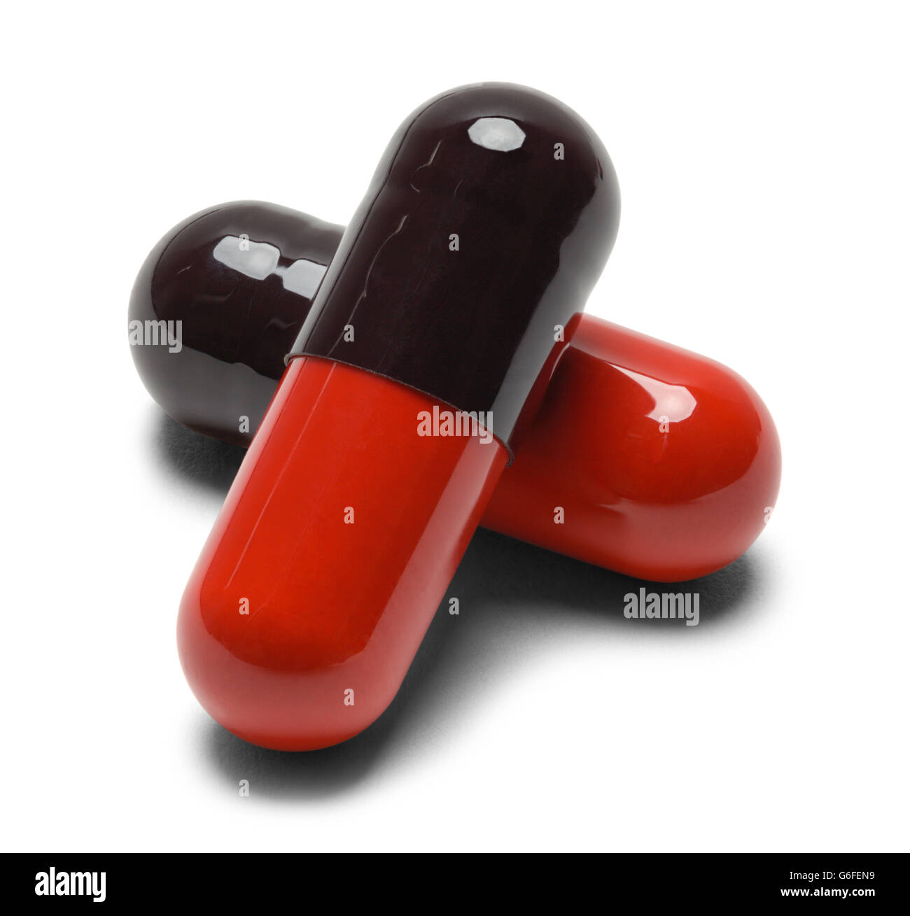 Due medicina pillola capsule isolati su sfondo bianco. Foto Stock