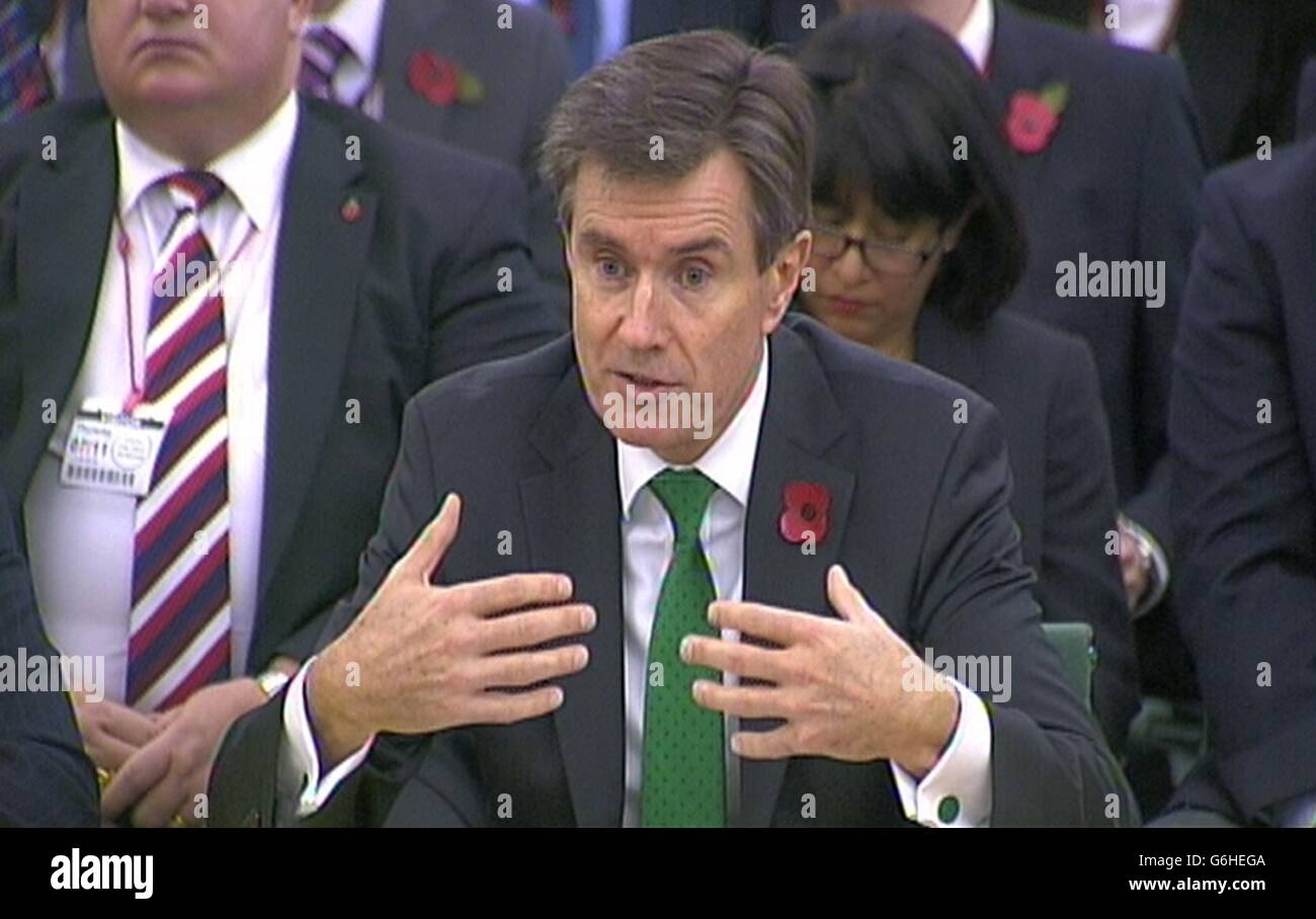 Il capo del Secret Intelligence Service, Sir John Sawers, parlando al primo Comitato parlamentare per l'intelligenza e la sicurezza (ISC) di Londra. Foto Stock