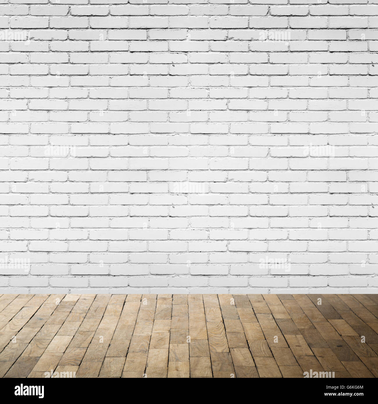Abstract vuoto interno con pavimento in legno e il bianco muro di mattoni, quadrato foto di sfondo texture Foto Stock