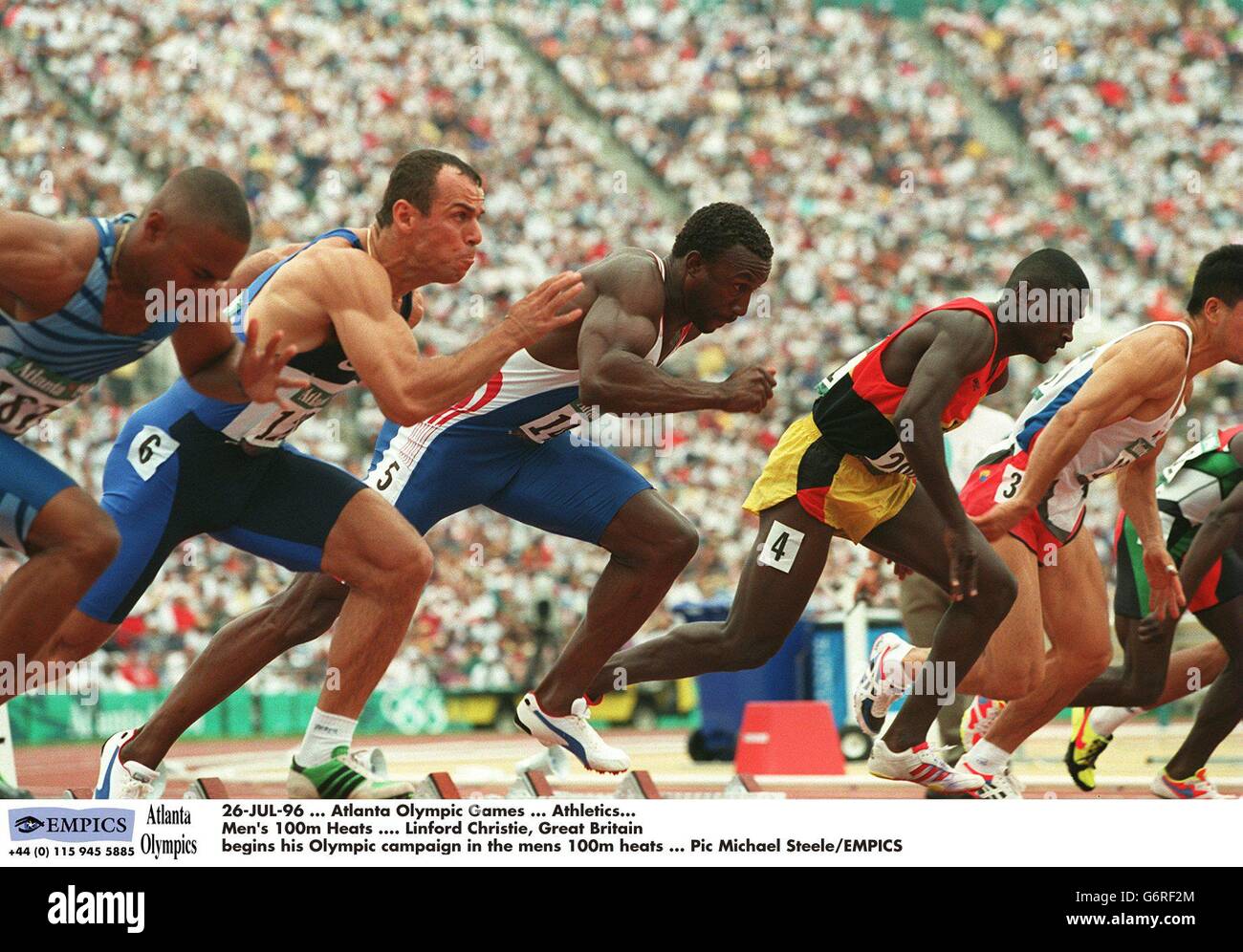 26-JUL-96 ... Giochi Olimpici di Atlanta ... Atletica. Uomini 100m Heats .... Linford Christie, Gran Bretagna inizia la sua campagna olimpica nei Mens 100m riscaldatori Foto Stock