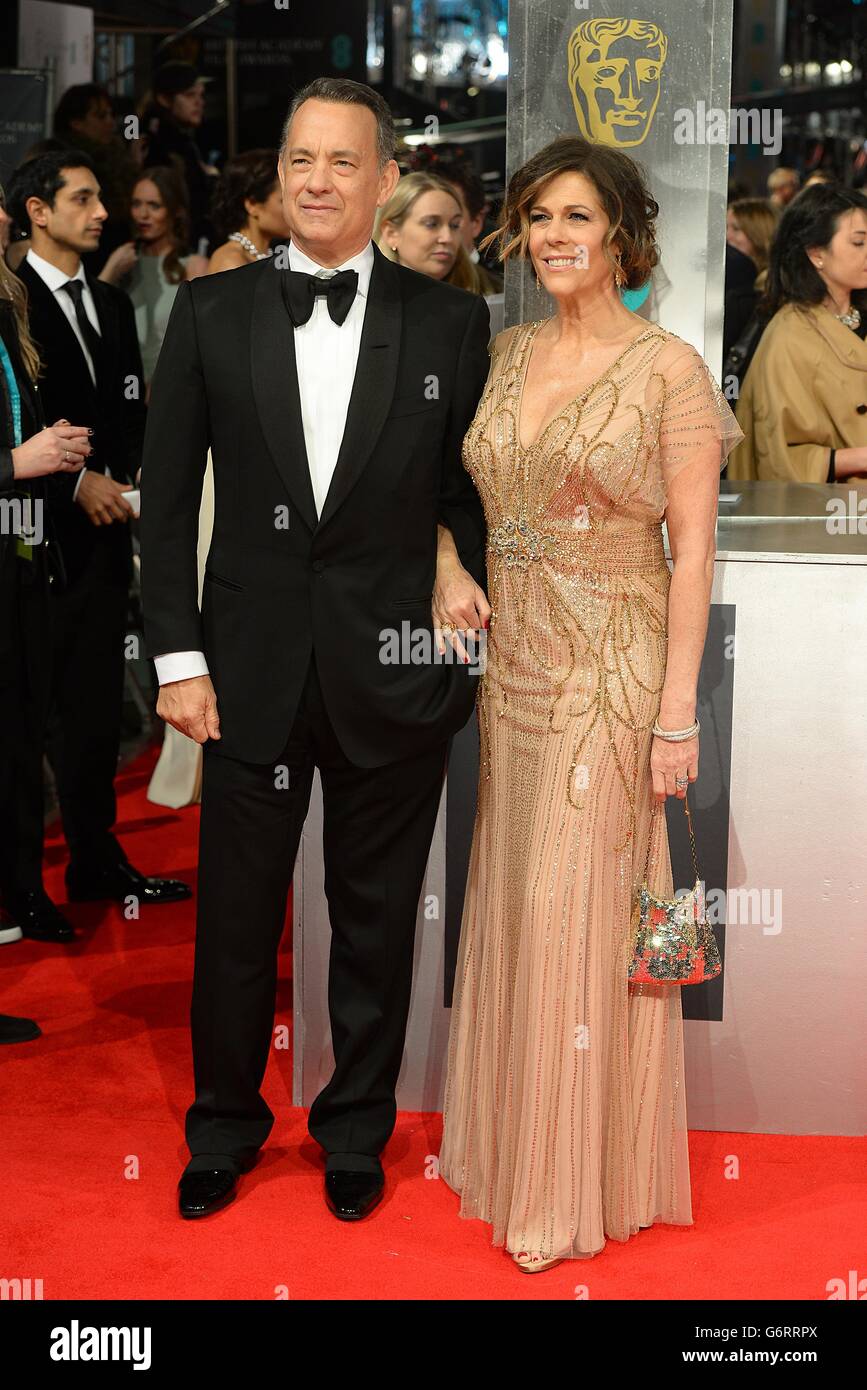 Tom Hanks e Rita Wilson arrivano all'EE British Academy Film Awards 2014, presso la Royal Opera House, Bow Street, Londra. Foto Stock