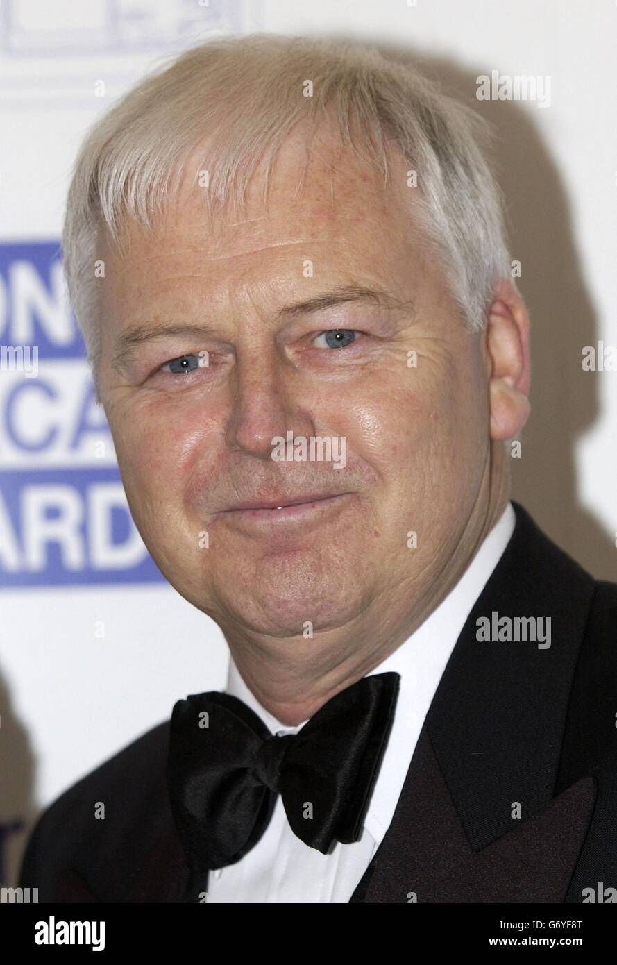 Ian Lavender, attore di EastEnders, arriva per i Sony radio Academy Awards alla Grosvenor House di Park Lane, nel centro di Londra. Foto Stock