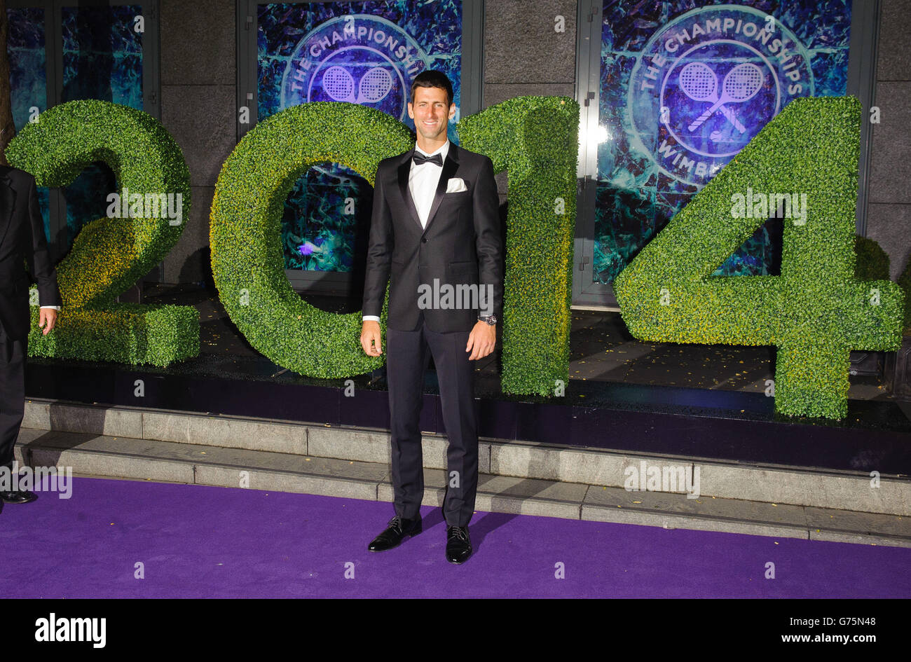 Il vincitore maschile di Wimbledon Novak Djokovic arriva alla Wimbledon Champions Dinner 2014, presso la Royal Opera House, a Covent Garden, Londra. Foto Stock