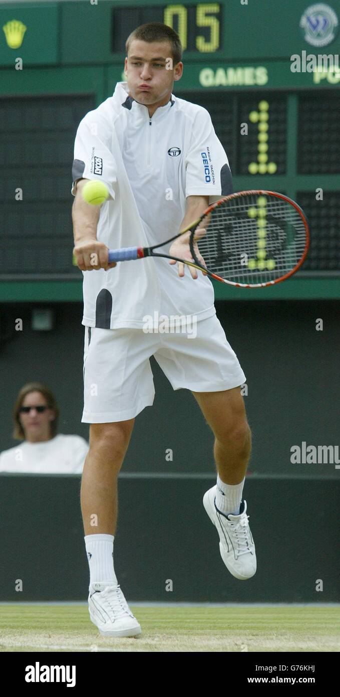 SOLO PER USO EDITORIALE, NON PER USO COMMERCIALE. Mikhail Youzhny dalla Russia in azione sulla Corte uno dove ha battuto il sedicesimo seme Nicolas Escude dalla Francia a Wimbledon. Youzhny trionfò in quattro set 6:2/1:6/6:3/6:3. Foto Stock