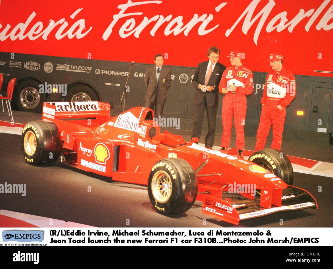 (R/L)Eddie Irvine, Michael Schumacher, Luca di Montezemolo & Jean Todt lanciano la nuova Ferrari Formula 1 F310B Foto Stock