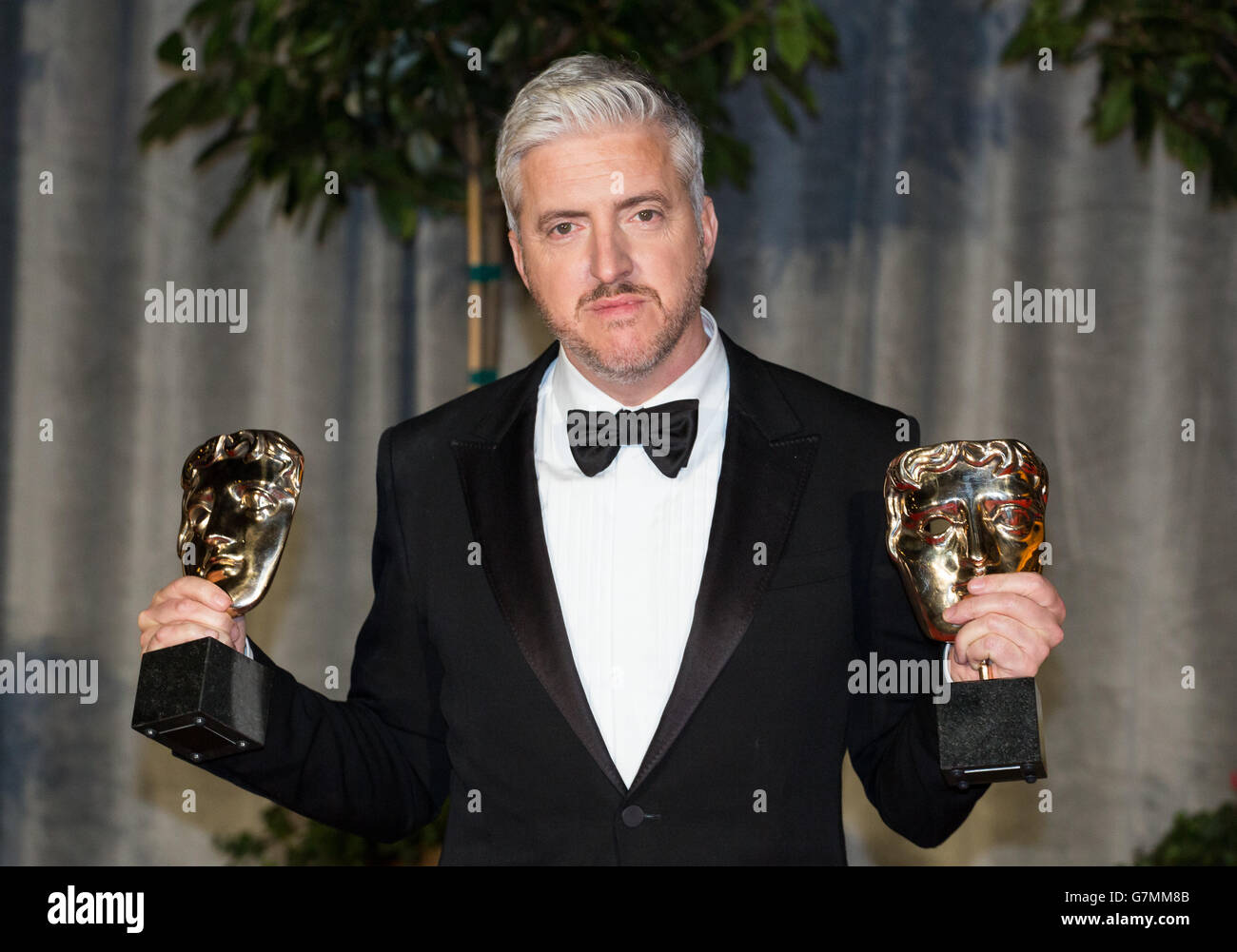Anthony McCarten, vincitore del Best Adapted Screenplay per "The Theory of Everything", partecipa alla festa dopo lo spettacolo per l'EE British Academy Film Awards al Grosvenor House Hotel nel centro di Londra. Foto Stock