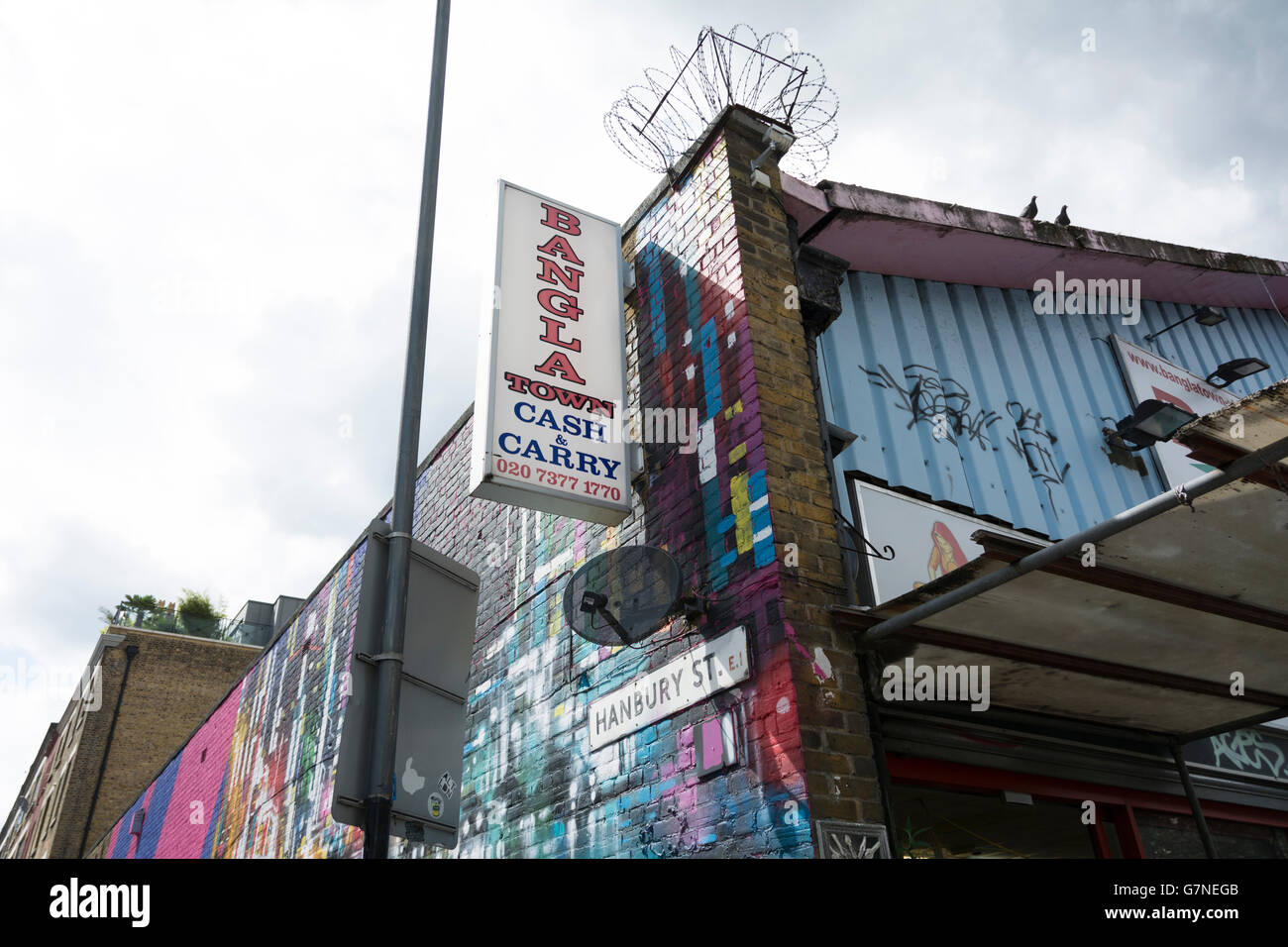 Acquirenti di Hanbury Street in East End di Londra. Foto Stock