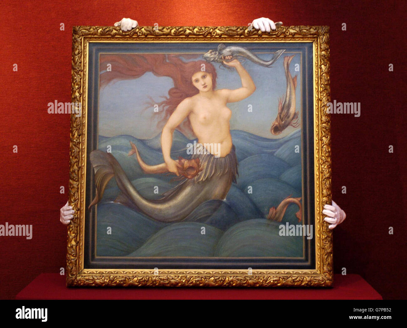 "A Sea Nymph", di Sir Edward Coley Burne-Jones (1880), è installato presso la sala d'aste di Christie, prima di una vendita di importante British Art Foto Stock