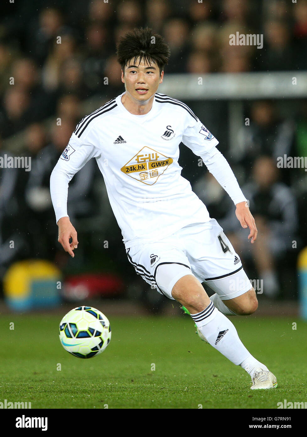 Calcio - Barclays Premier League - Swansea City / Liverpool - Liberty Stadium. Il Ki Sung-Yueng di Swansea City durante la partita della Barclays Premier League al Liberty Stadium di Swansea. Foto Stock