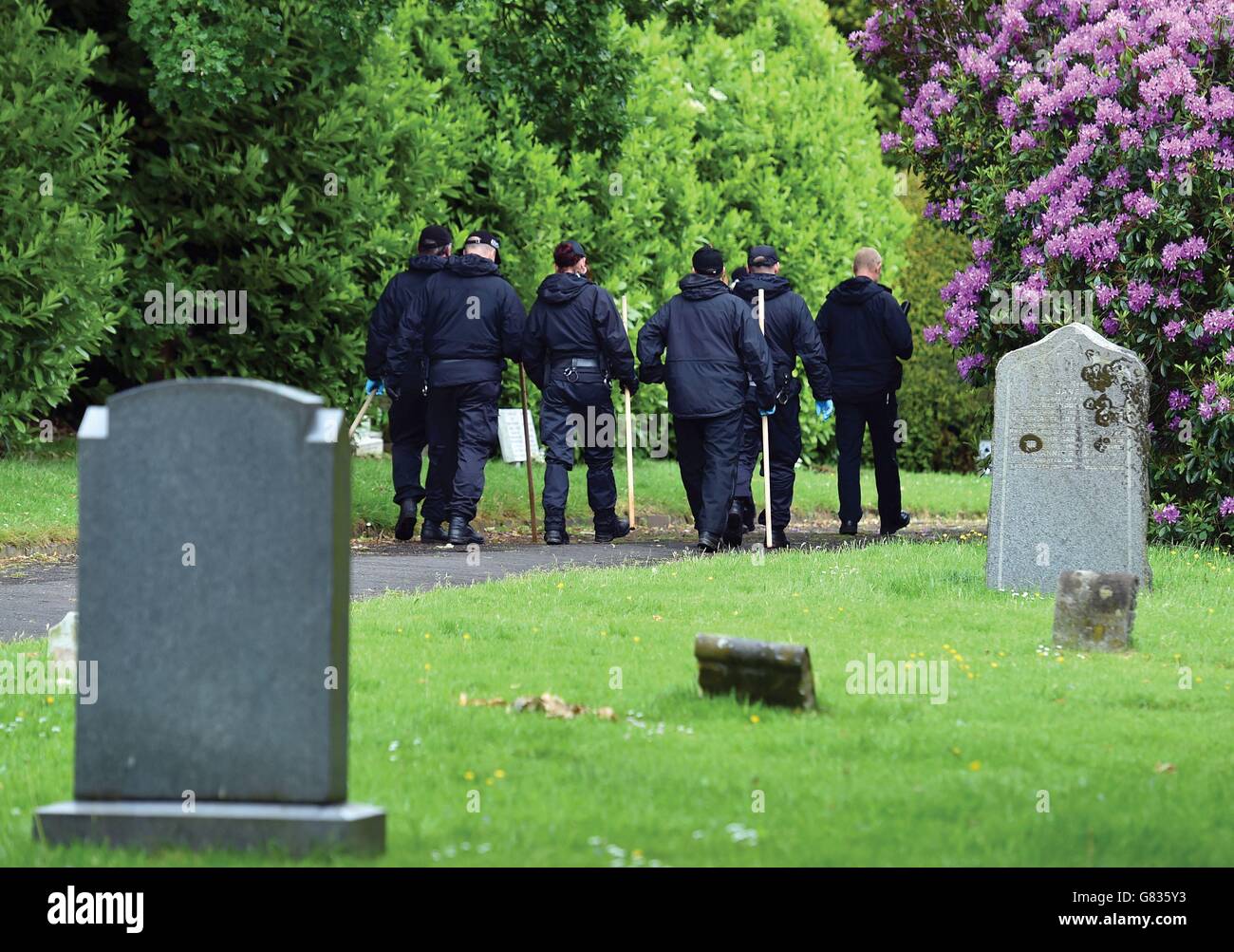 Omicidio nel cimitero Foto Stock