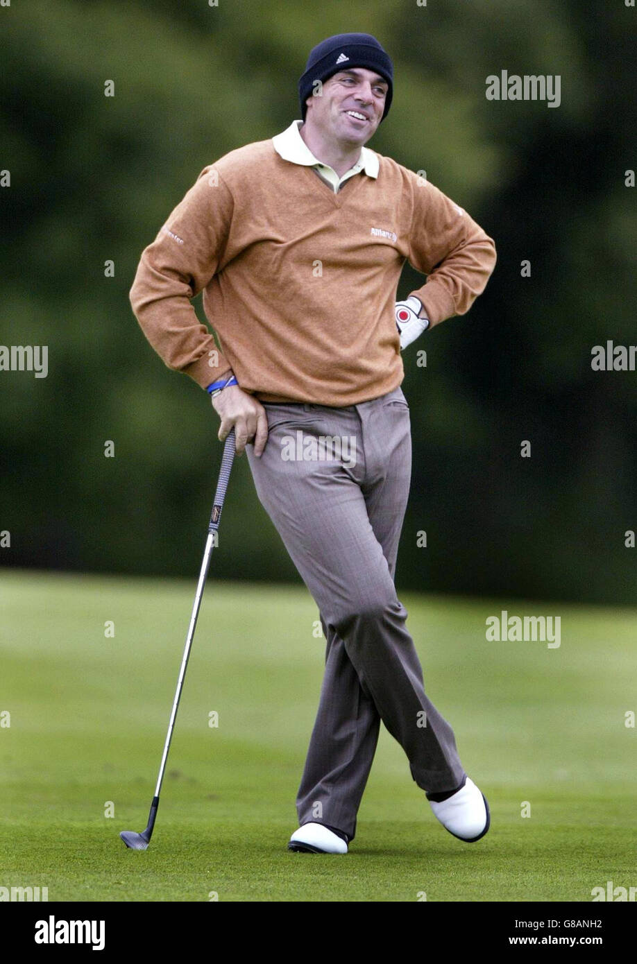 L'irlandese Paul McGinley sorride dopo il suo secondo colpo al 13 ° verde. Foto Stock