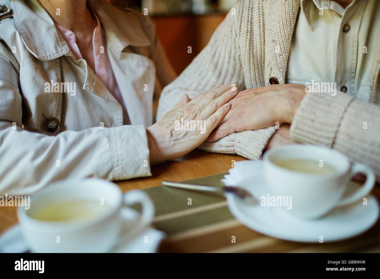 Anziani in caffè Foto Stock