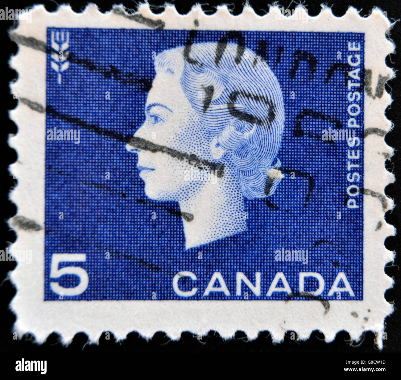 CANADA - 1962 CIRCA: un timbro stampato in Canada che mostra un ritratto della regina Elisabetta II e agricoltura simbolo, 1962 circa. Foto Stock