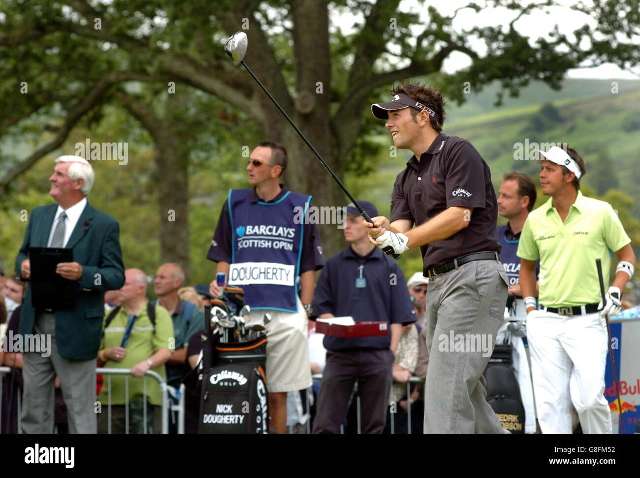 Golf - Barclays Scottish Open 2005 - Loch Lomond. Il Nick Dougherty dell'Inghilterra si tee fuori sulla prima buca. Foto Stock