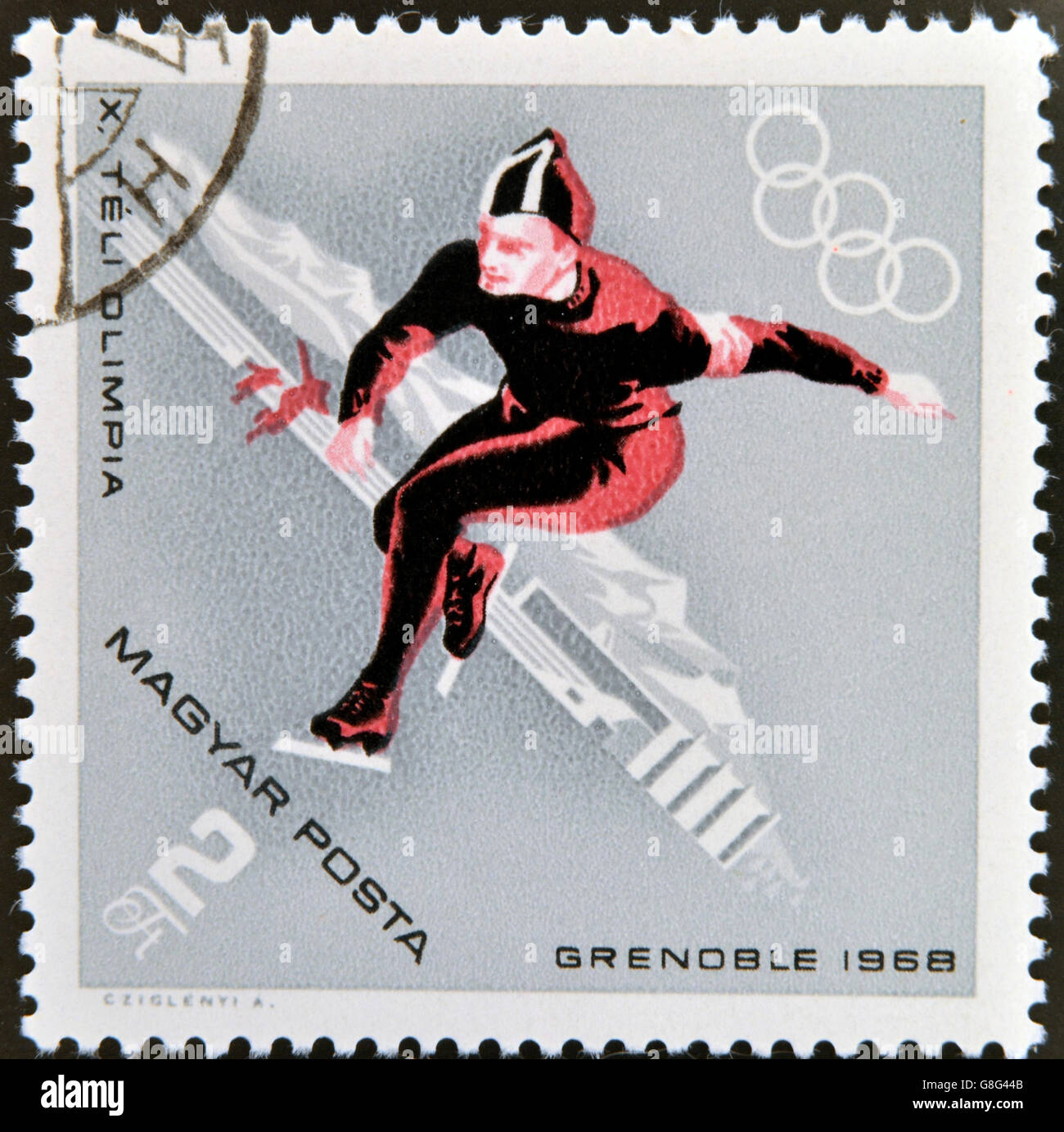 Ungheria - circa 1968: Un timbri stampato in Ungheria che mostra un atleta del pattinaggio di velocità,l'inverno sport olimpici a Grenoble 1968, cir Foto Stock