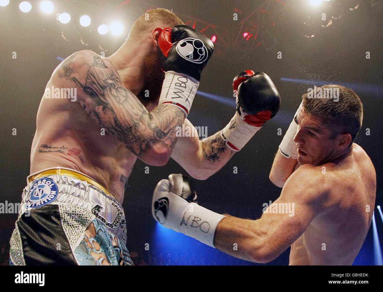 Pugilato - Manchester Arena. Liam Smith (a destra) e Jimmy Kelly durante la loro partita WBO World Super-Welterweight Championship alla Manchester Arena. Foto Stock