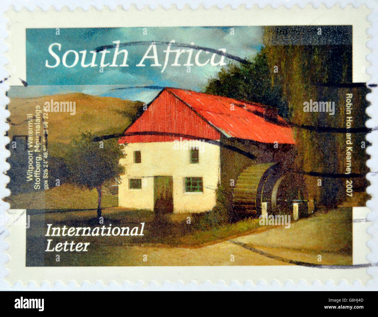 Repubblica del Sud Africa - circa 2007: un timbro stampato in RSA mostra un dipinto ad acquerello di un mulino a vento di Stoffberg, Mpumalanga Foto Stock