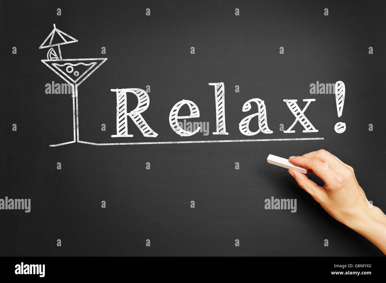 Scrive a mano " Relax!!!" sulla lavagna Foto Stock