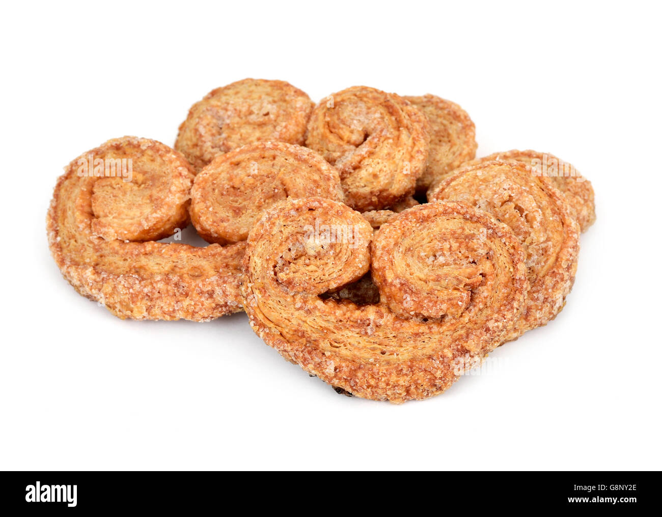 Alcuni palmier pasticceria fatta con farina di farro su sfondo bianco Foto Stock