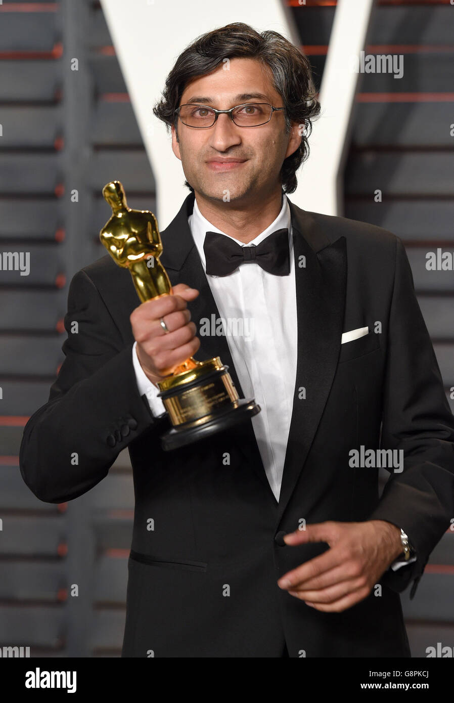 Asif Kapadia arriva al Vanity Fair Oscar Party a Beverly Hills, Los Angeles, California, USA, 28 febbraio 2016. PREMERE ASSOCIAZIONE foto. Data immagine: Domenica 28 febbraio 2016. Guarda gli Oscar SHOWBIZ della storia di PA. Il credito fotografico deve essere: Filo PA/filo PA Foto Stock