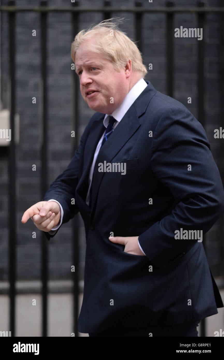 Il Sindaco di Londra Boris Johnson arriva per un incontro di Cobra a Downing Street, Londra, in quanto almeno 21 persone sono state uccise e molte altre sono rimaste ferite dopo gli attacchi di bombe terroristiche all'aeroporto principale e al sistema metropolitano di Bruxelles. Foto Stock