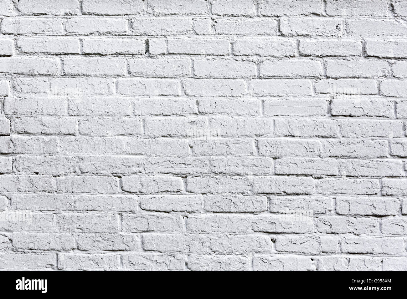 A spiovente dipinte di bianco muro di mattoni texture come sfondo Foto Stock